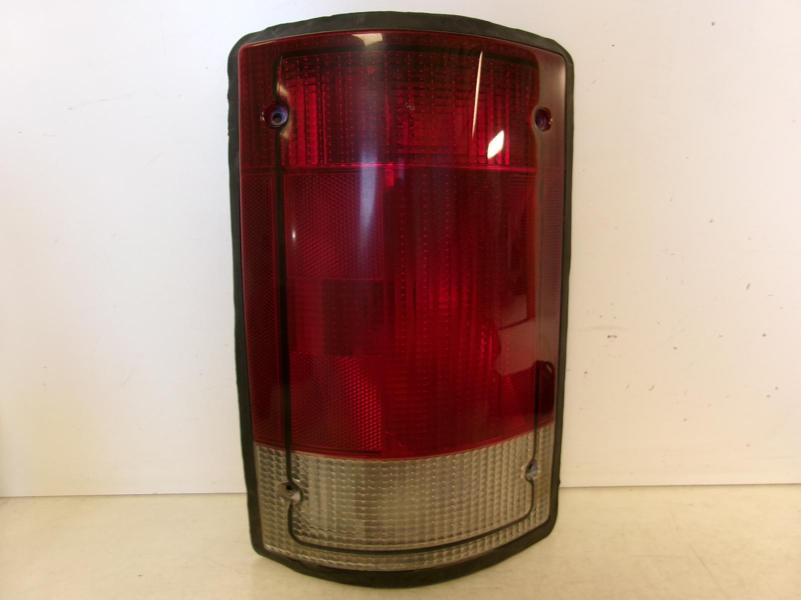 1995 - 2004 Ford E150 E250 E350 Driver LH Outer Quarter Panel Tail Light OEM