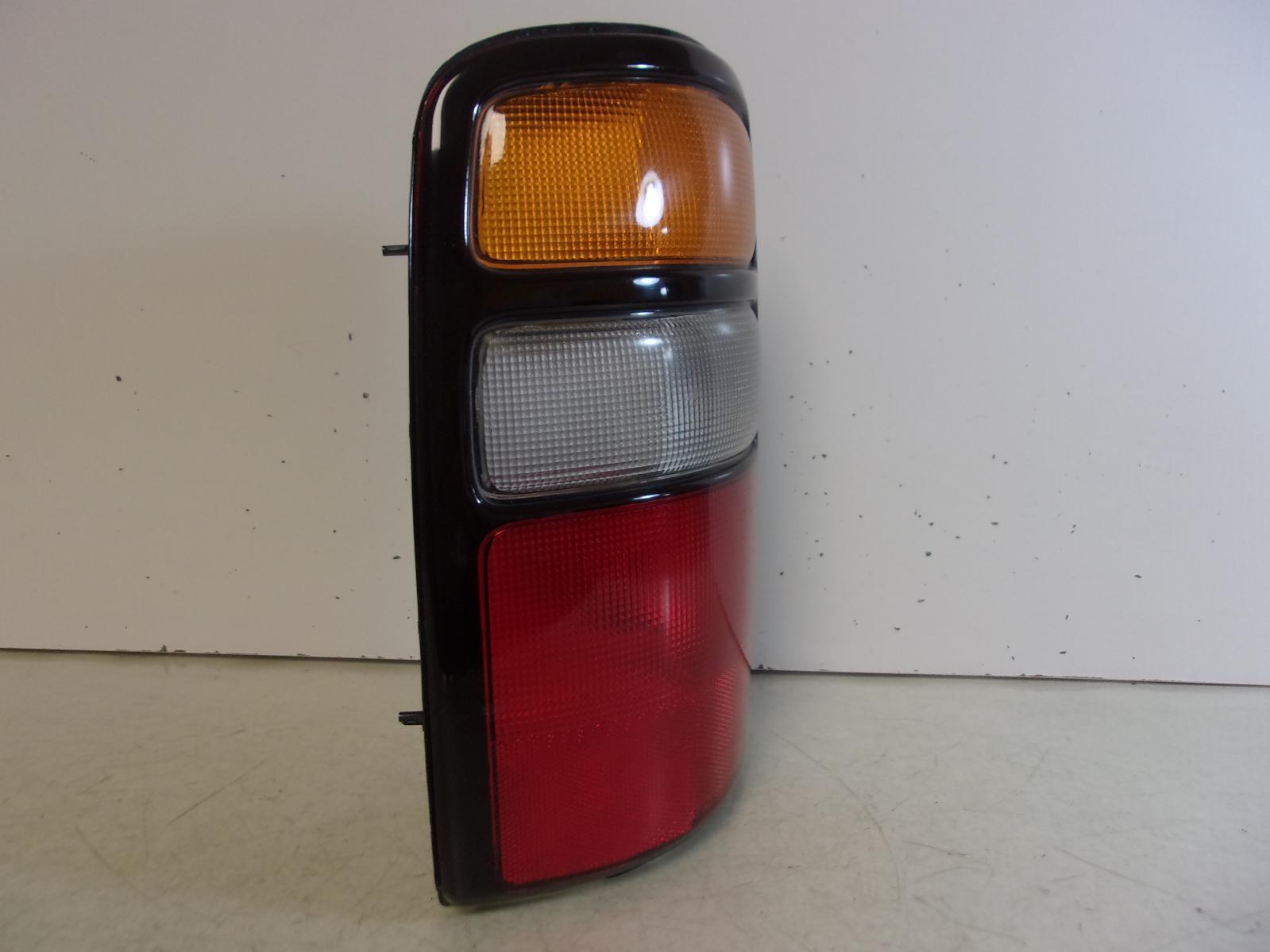 2004 2005 2006 Chevrolet Suburban / Tahoe / GMC Yukon Driver LH Tail Light OEM - 0