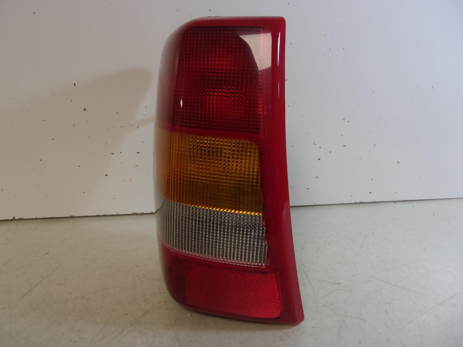 2003 2004 Jeep Grand Cherokee Driver LH Tail Light OEM