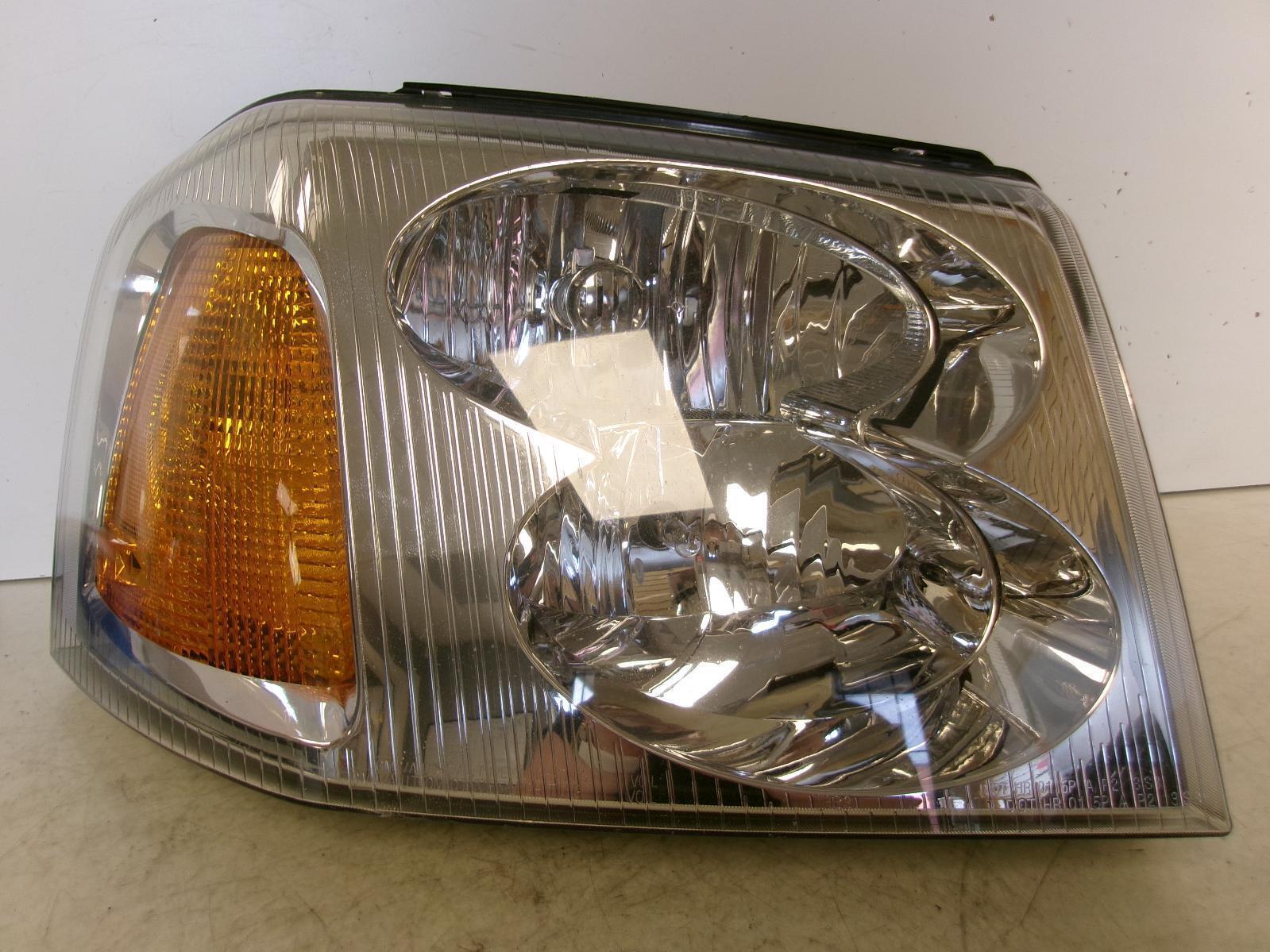 2002 - 2009 GMC Envoy Passenger Rh Halogen Headlight OEM