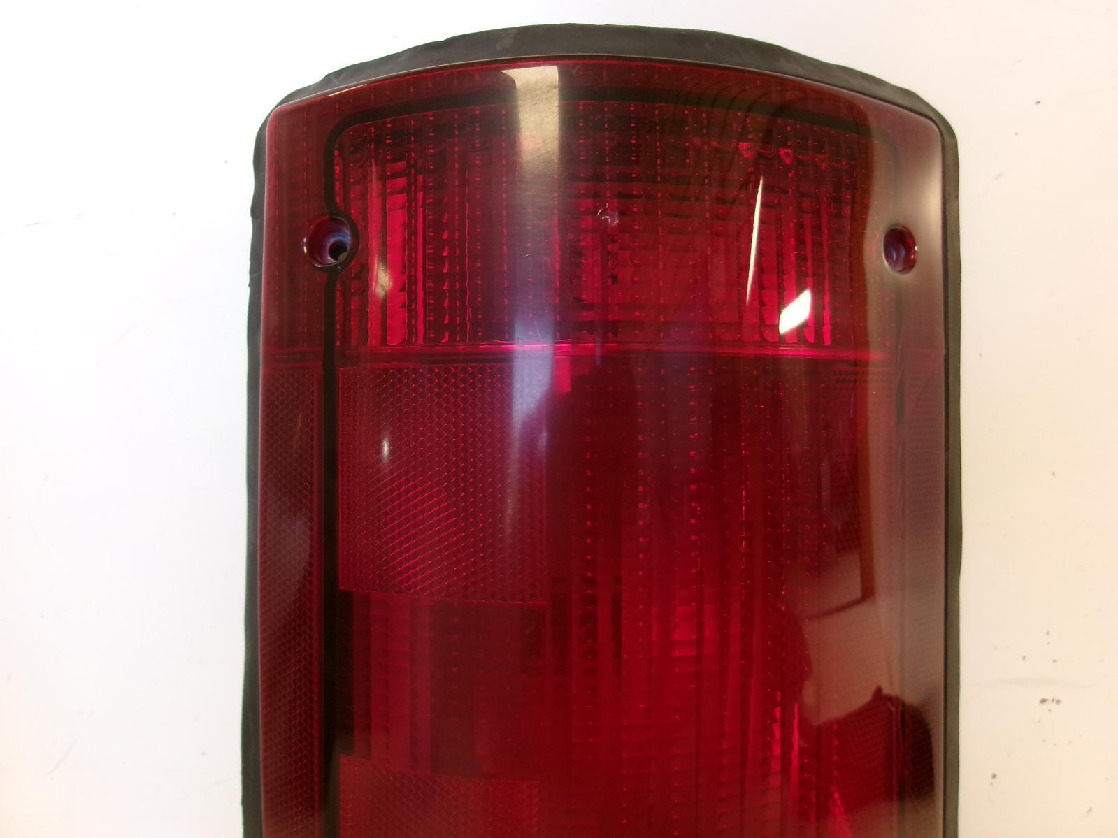 1995 - 2004 Ford E150 E250 E350 Driver LH Outer Quarter Panel Tail Light OEM