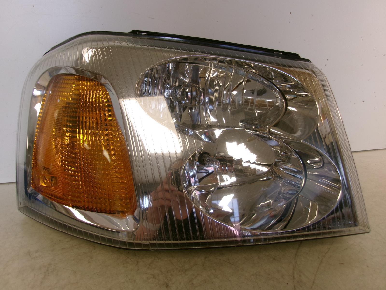 2002 - 2009 GMC Envoy Passenger Rh Halogen Headlight OEM