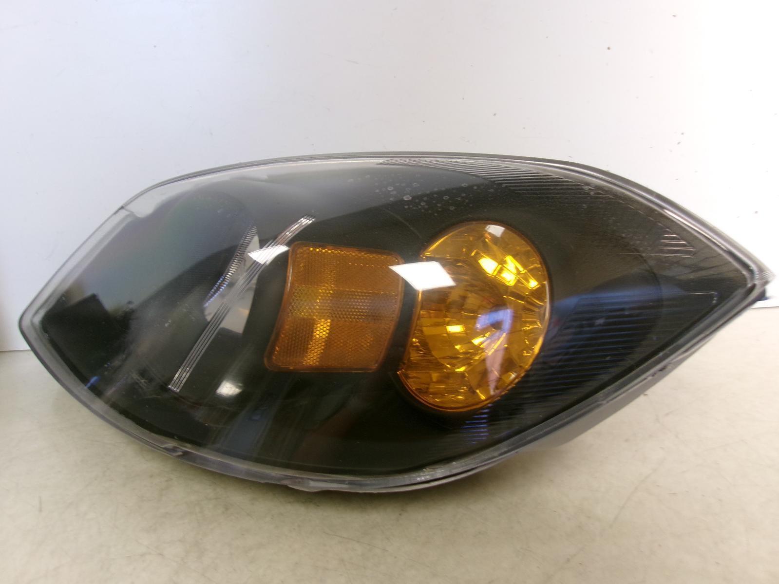 Fits 2008 Chevrolet Cobalt Driver LH Halogen Headlight W/ Black Trim