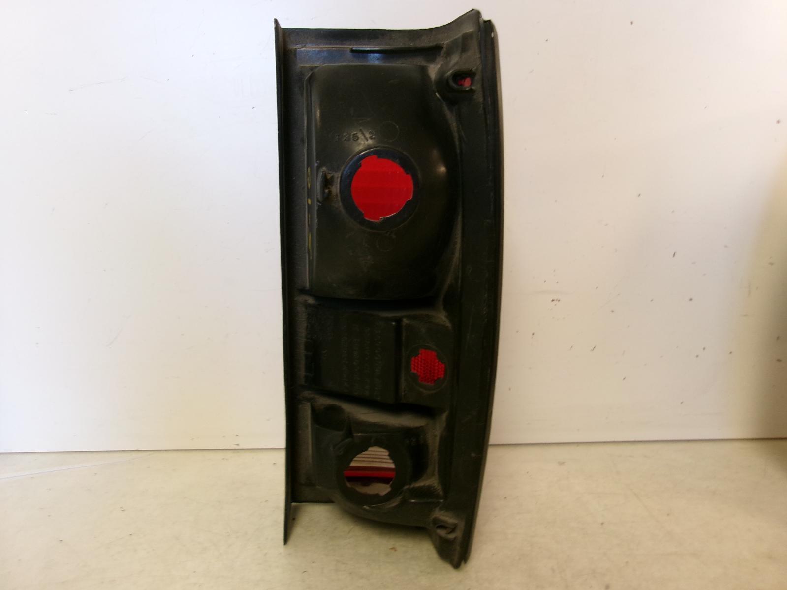 1982 - 1993 Chevrolet GMC S10 /  S15 / SONOMA Driver Outer Black Tail Light OEM