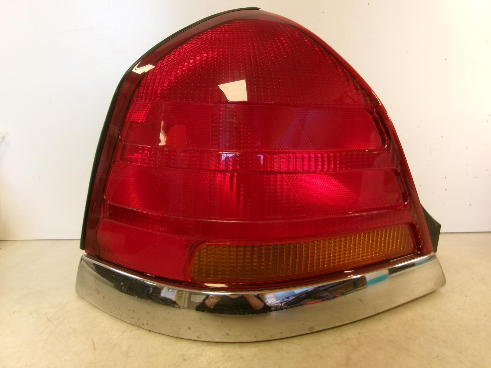 2001 2002 2003 Ford Crown Victoria Driver Lh Outer Chrome Trim Tail Light OEM