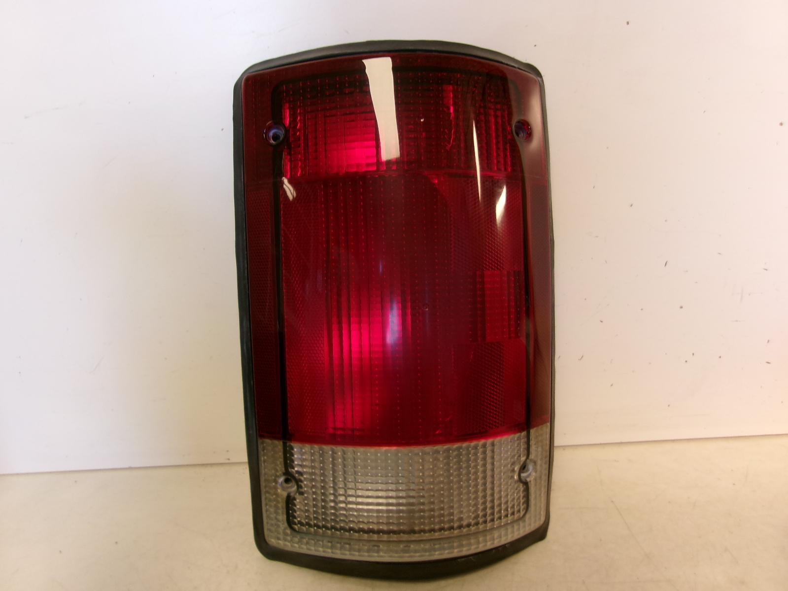 1995 - 2004 Ford E150 Passenger RH Outer Quarter Panel Tail Light OEM