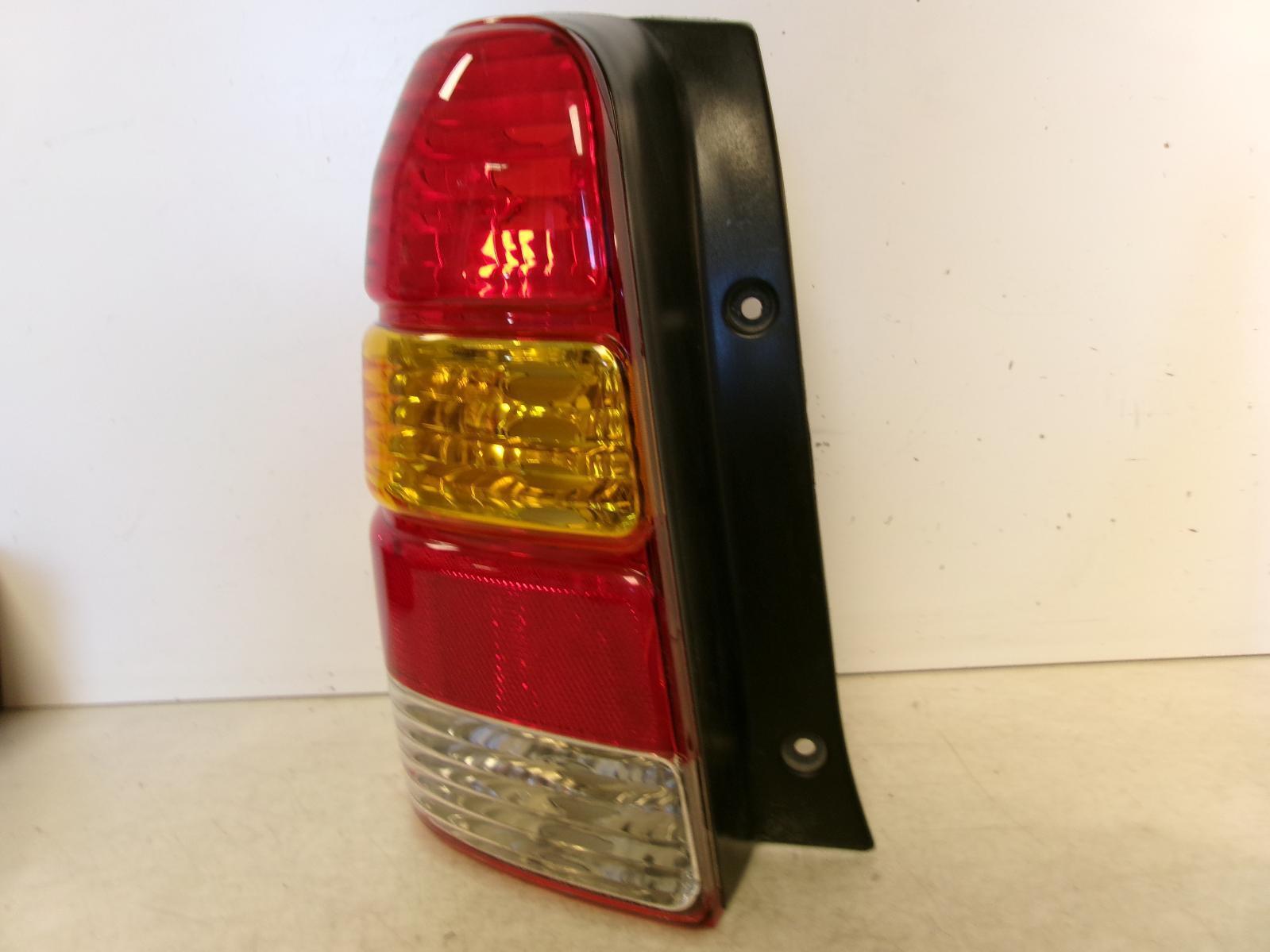 Fits 2001 - 2007 Ford Escape Driver Lh Outer Tail Light - Visteon - 0