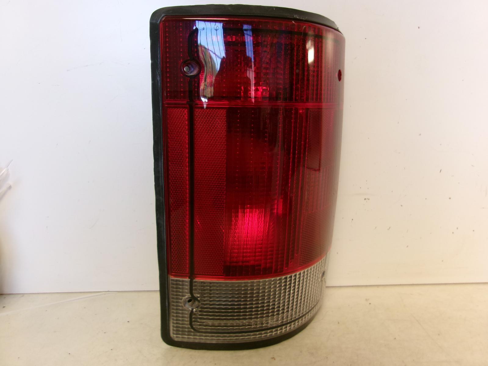 1995 - 2004 Ford E150 E250 E350 Passenger RH Outer Quarter Panel Tail Light OEM - 0