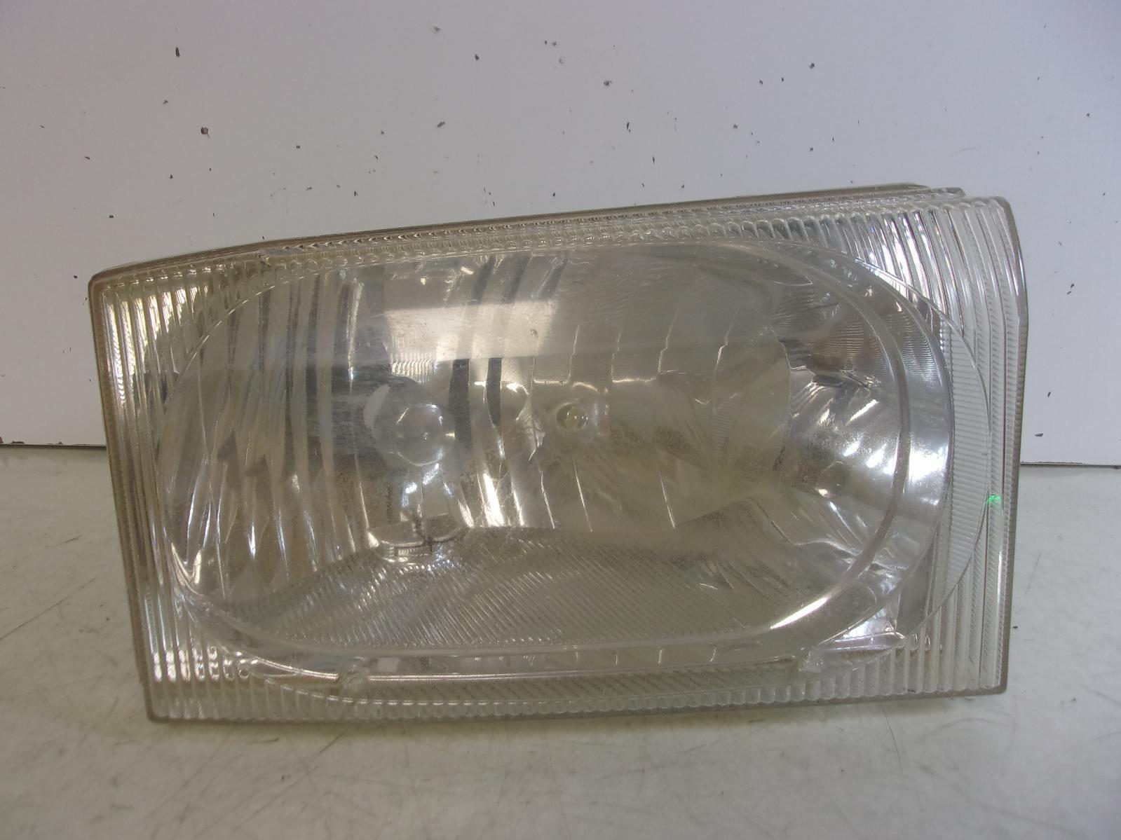 2002-2004 Ford F250 / F350 / Excursion Passenger RH Headlight OEM