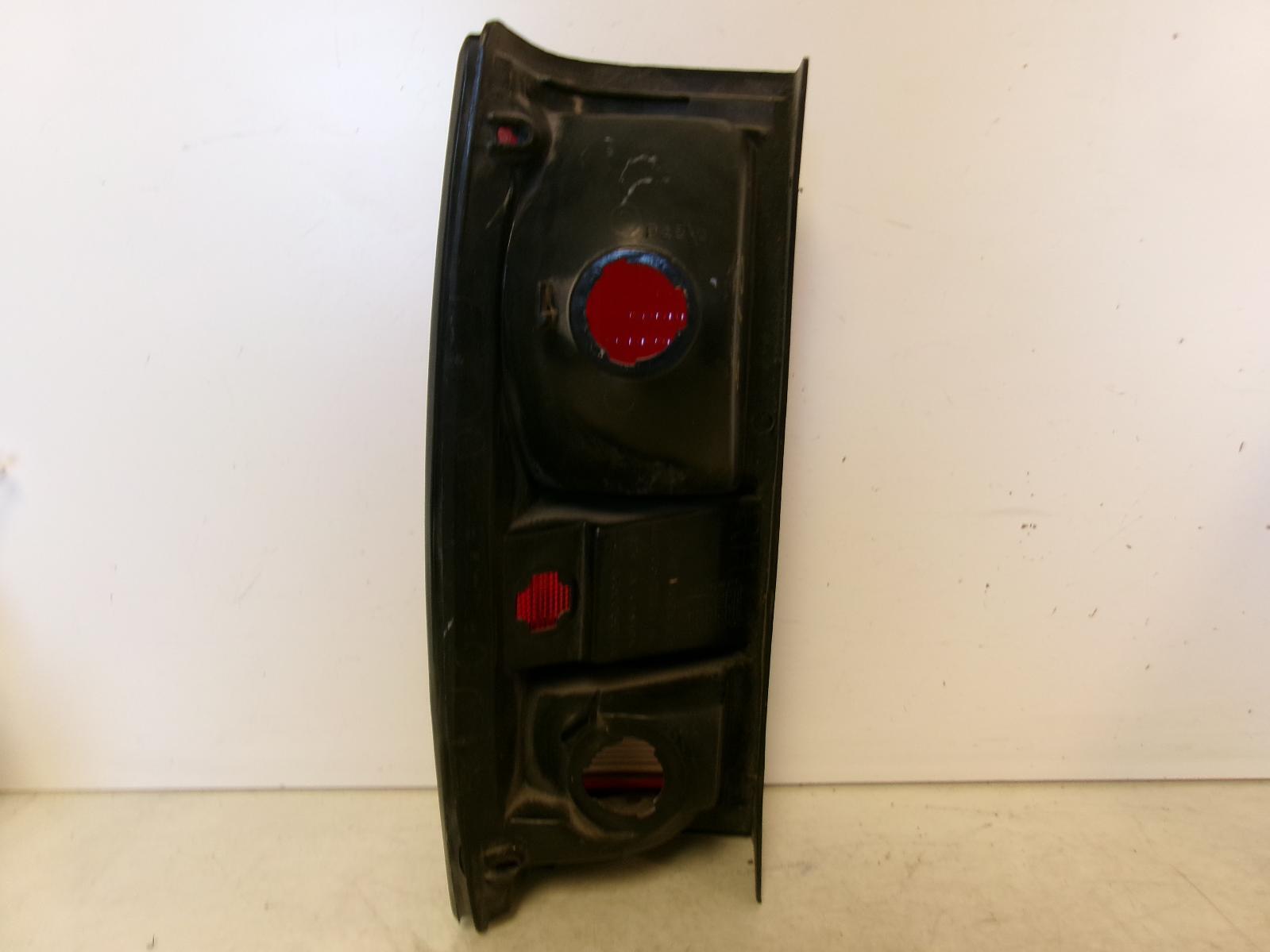 1982 - 1993 Chevrolet GMC S10 / S15 / Sonoma Passenger  Black Tail Light OEM