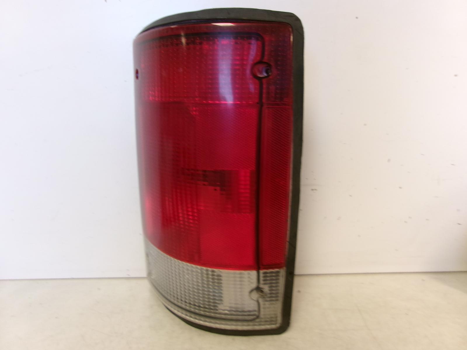 1995 - 2004 Ford E150 E250 E350 Passenger RH Outer Quarter Panel Tail Light OEM