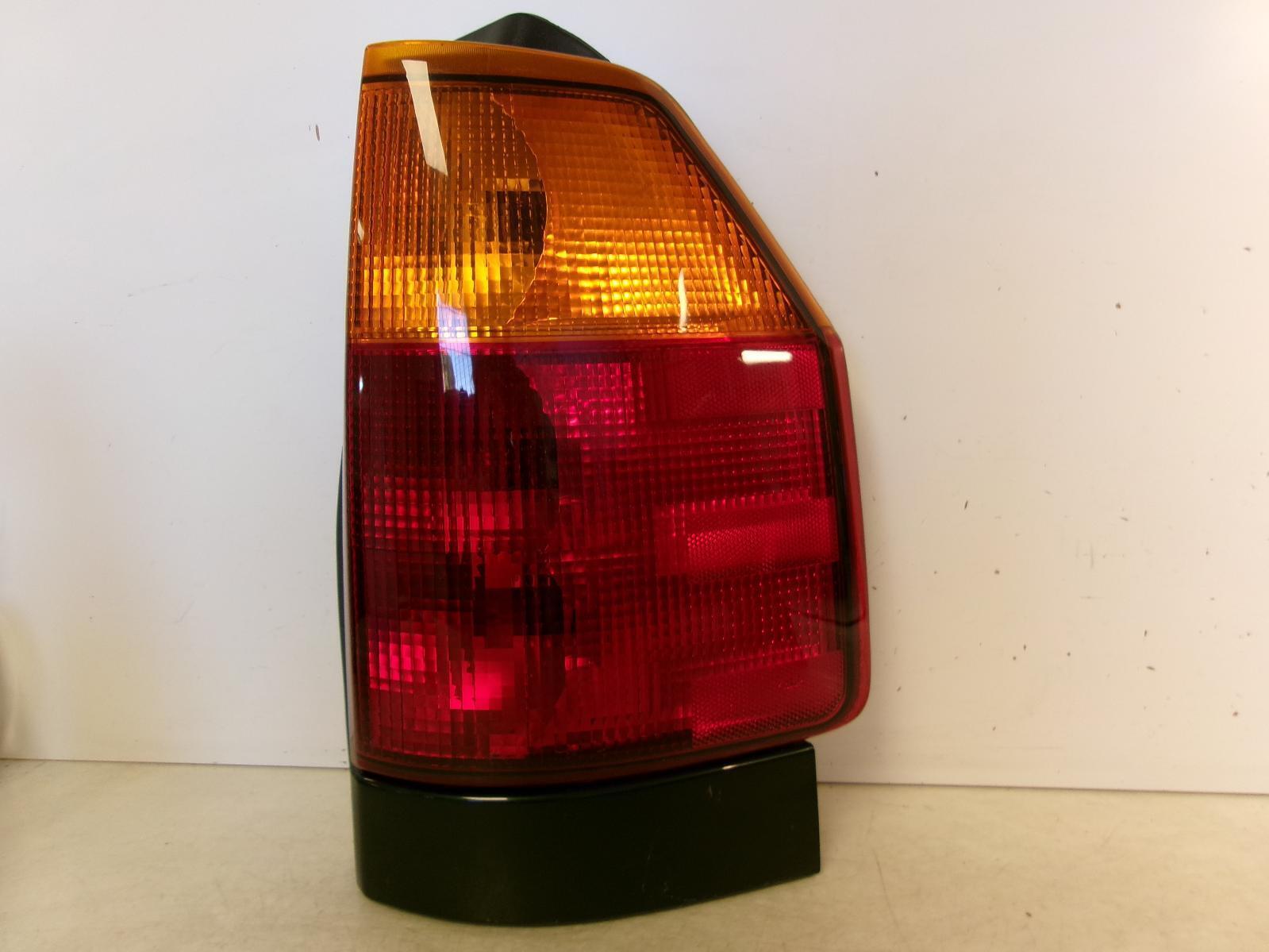 2002 - 2009 GMC Envoy Passenger RH Outer Quarter Panel Tail Light OEM