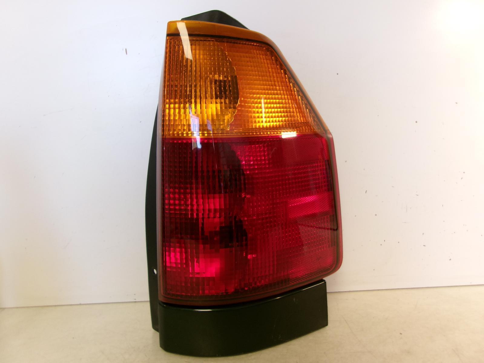 2002 - 2009 GMC Envoy Passenger RH Outer Quarter Panel Tail Light OEM