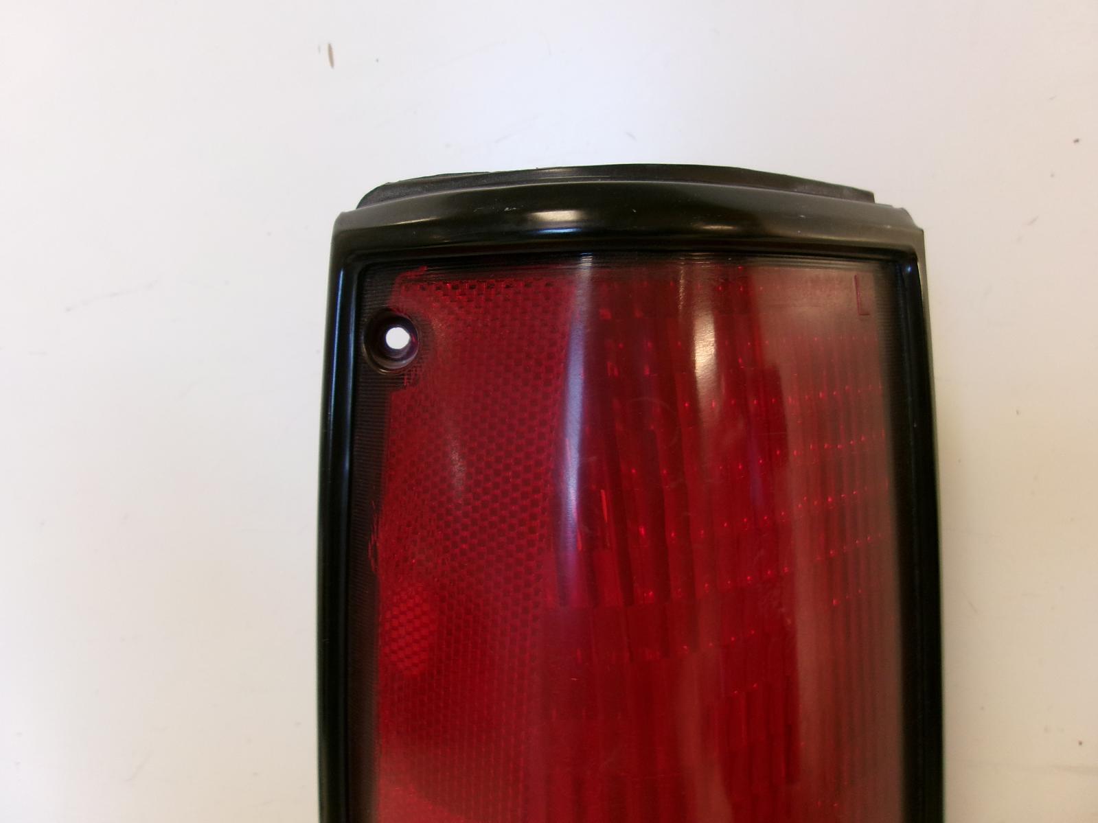 1982 - 1993 Chevrolet GMC S10 /  S15 / SONOMA Driver Outer Black Tail Light OEM