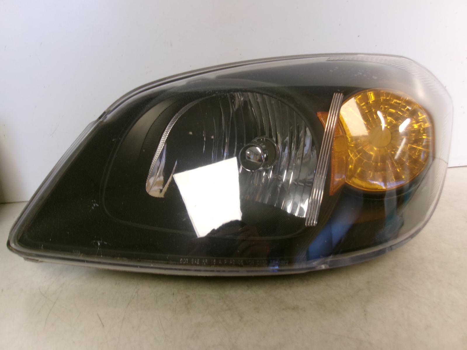 Fits 2008 Chevrolet Cobalt Driver LH Halogen Headlight W/ Black Trim