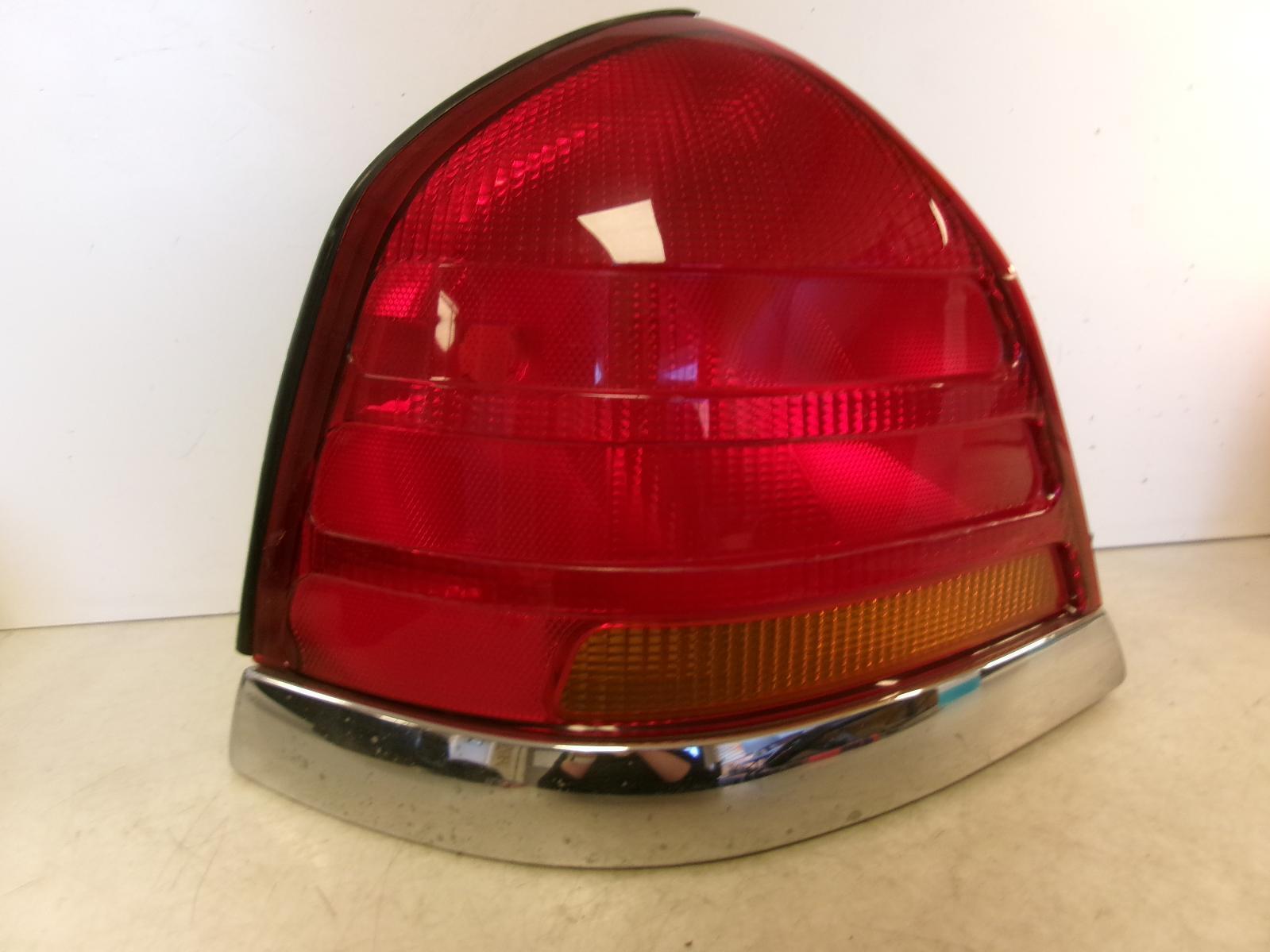 2001 2002 2003 Ford Crown Victoria Driver Lh Outer Chrome Trim Tail Light OEM