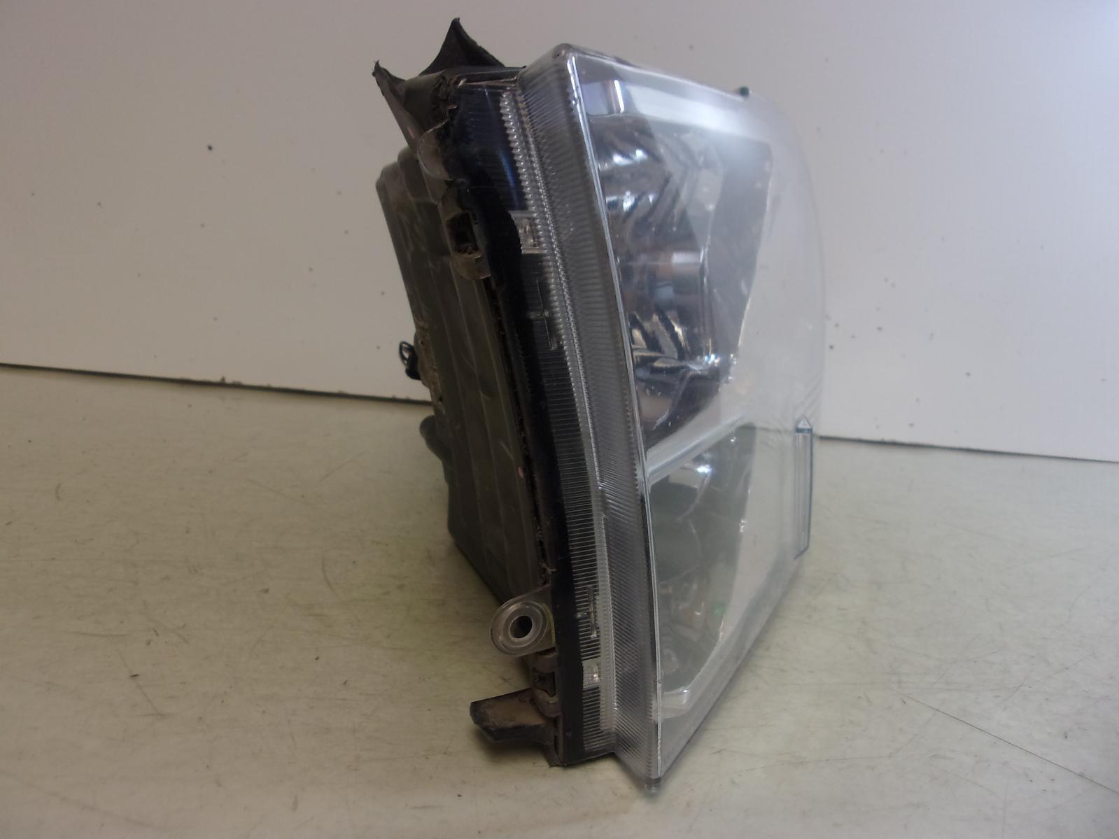 2013 - 2024 Dodge Ram Driver LH Quad Halogen Headlight OEM