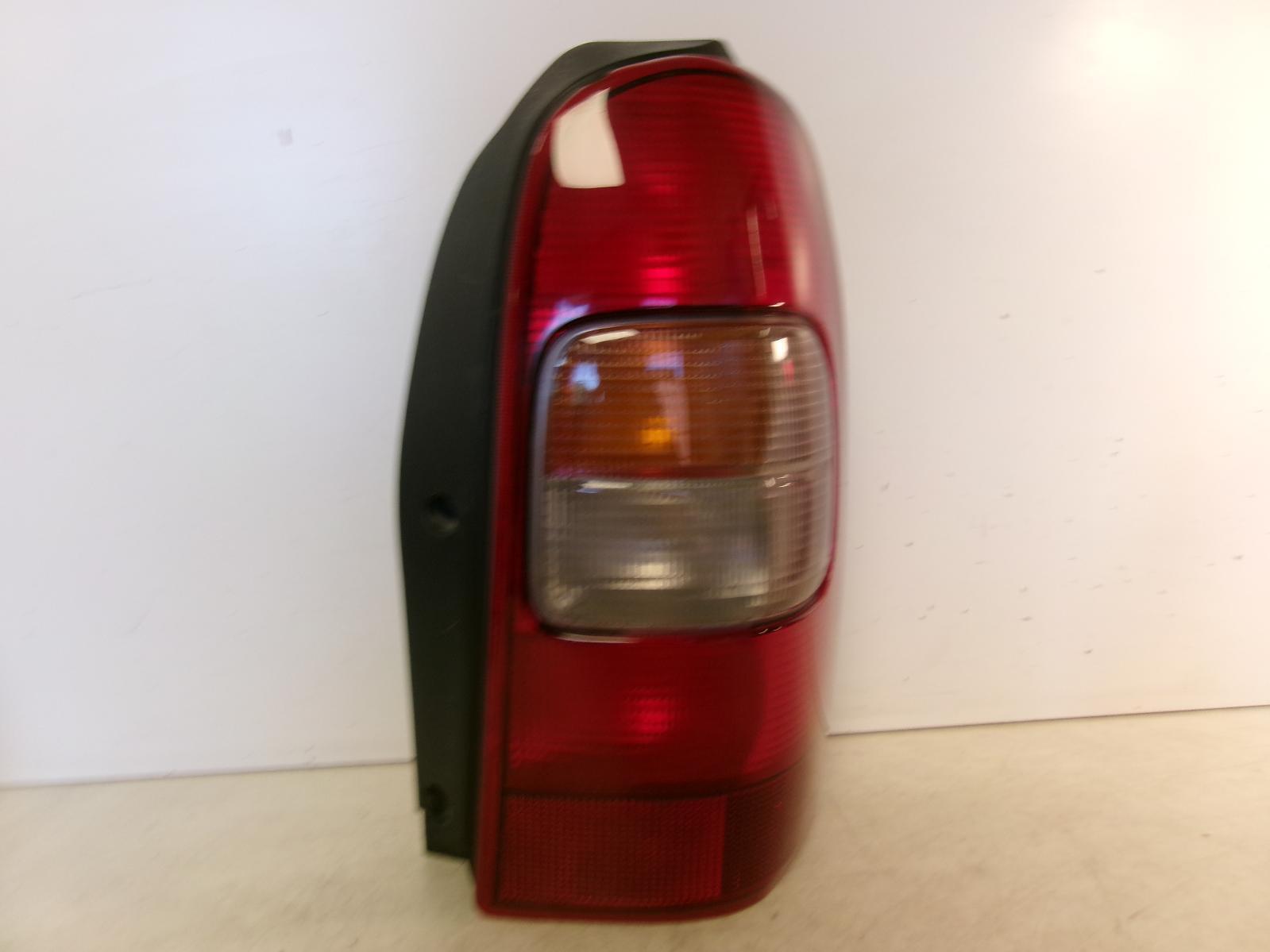 Fits 1997-2005 Chevrolet Venture / 1999-2005 Montana Passenger RH Tail Light - 0