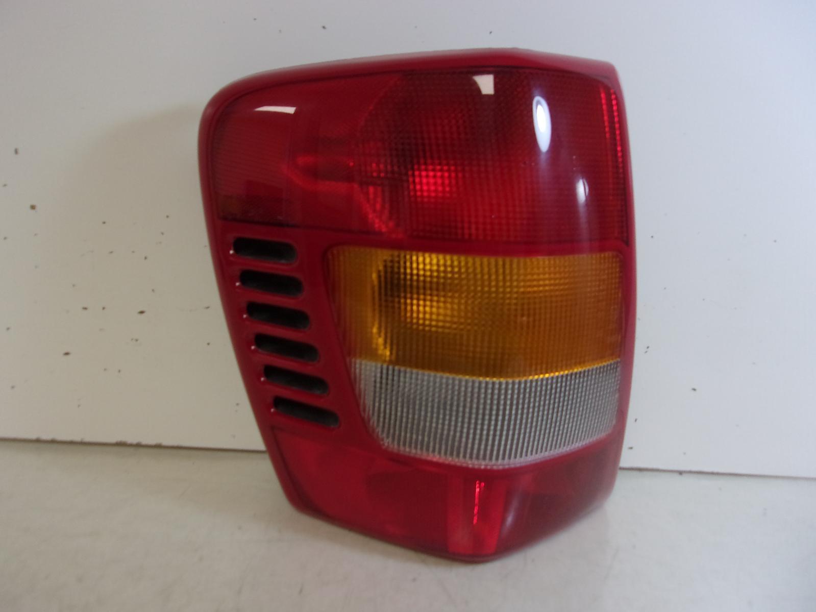 2003 2004 Jeep Grand Cherokee Driver LH Tail Light OEM