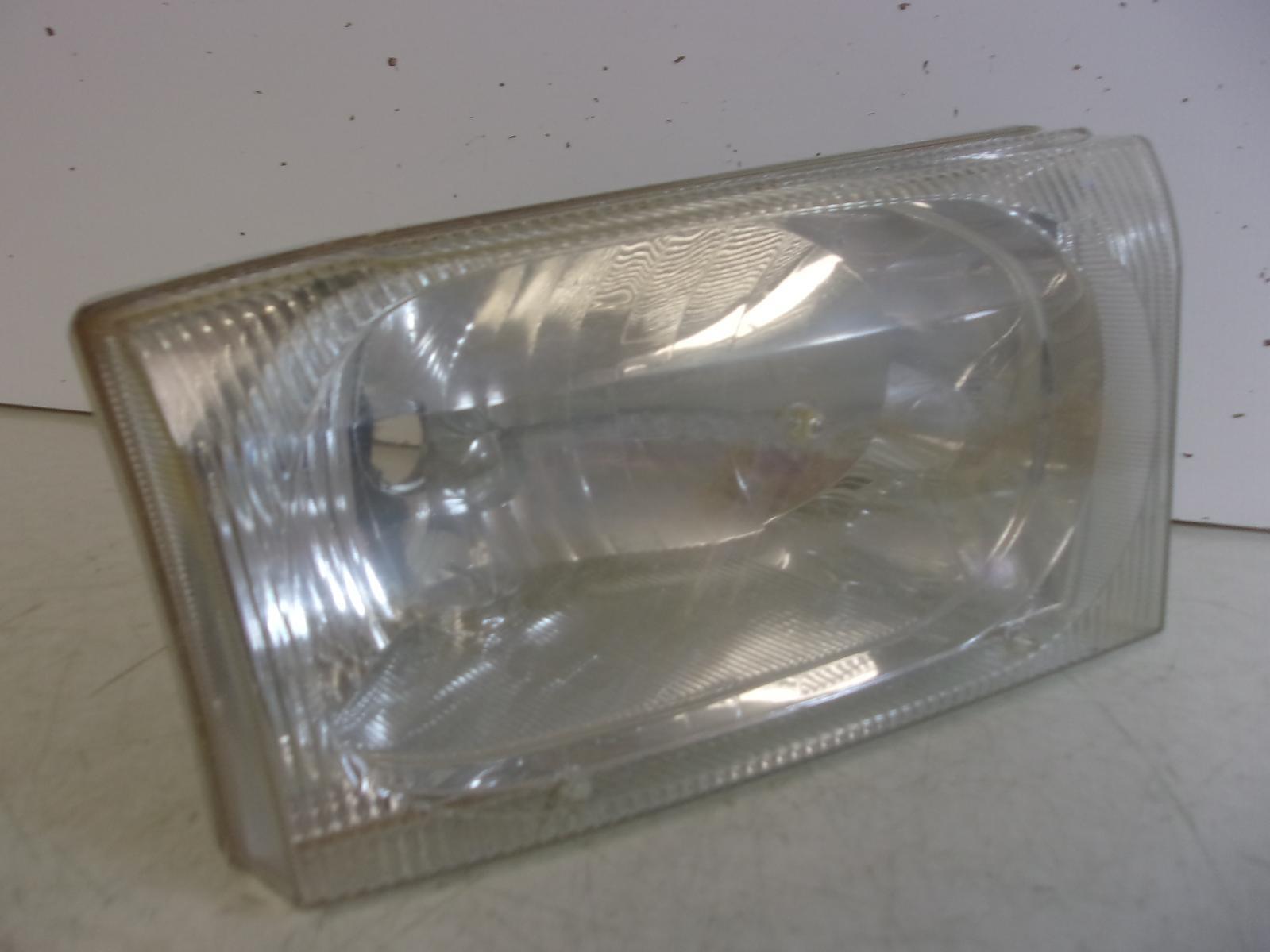 2002-2004 Ford F250 / F350 / Excursion Passenger RH Headlight OEM - 0