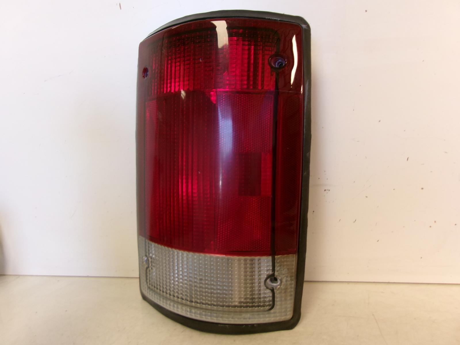 1995 - 2004 Ford E150 Passenger RH Outer Quarter Panel Tail Light OEM - 0