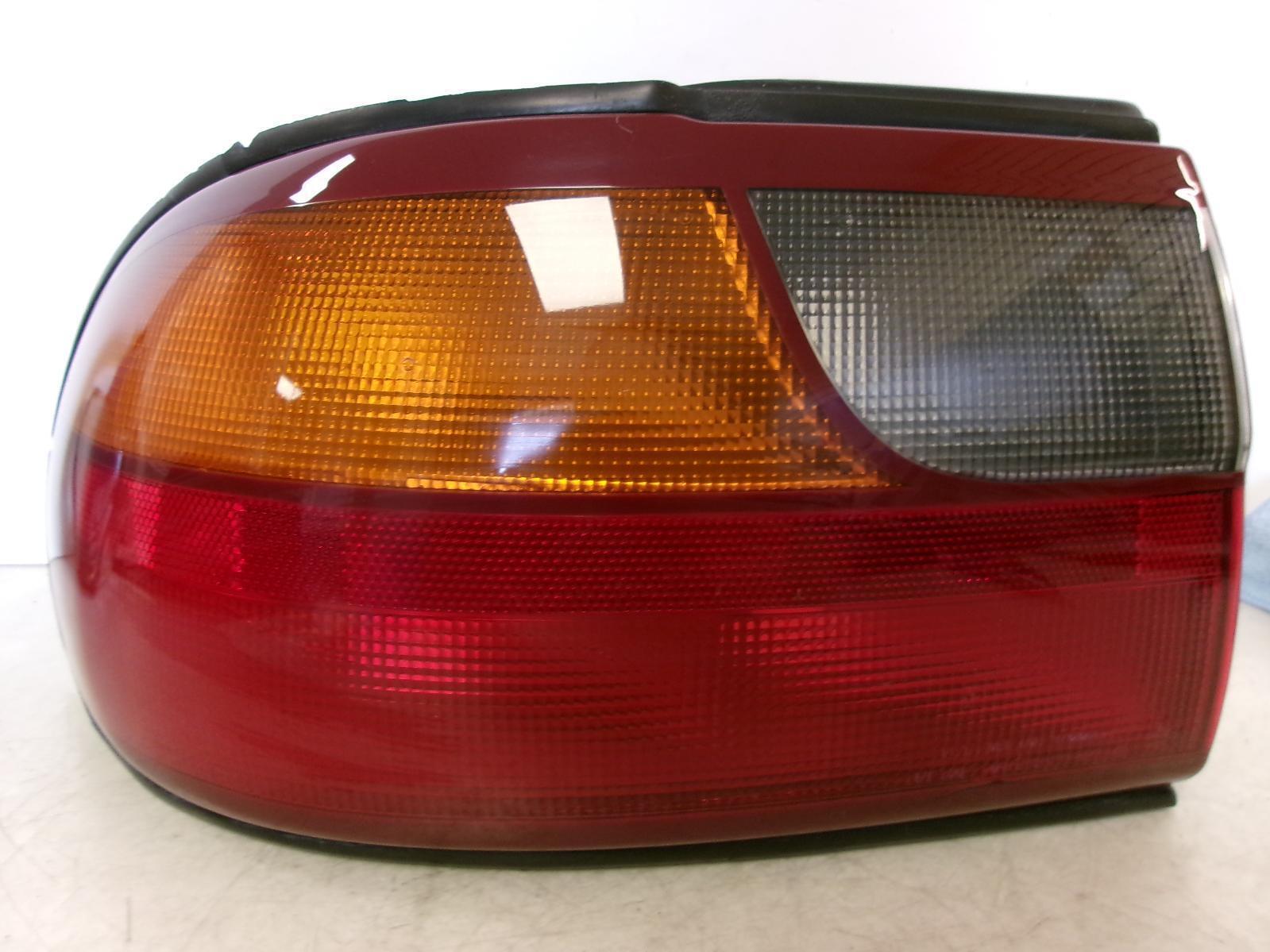 1997 - 2005 Chevrolet Malibu Driver Lh Outer Quarter Panel Tail Light OEM