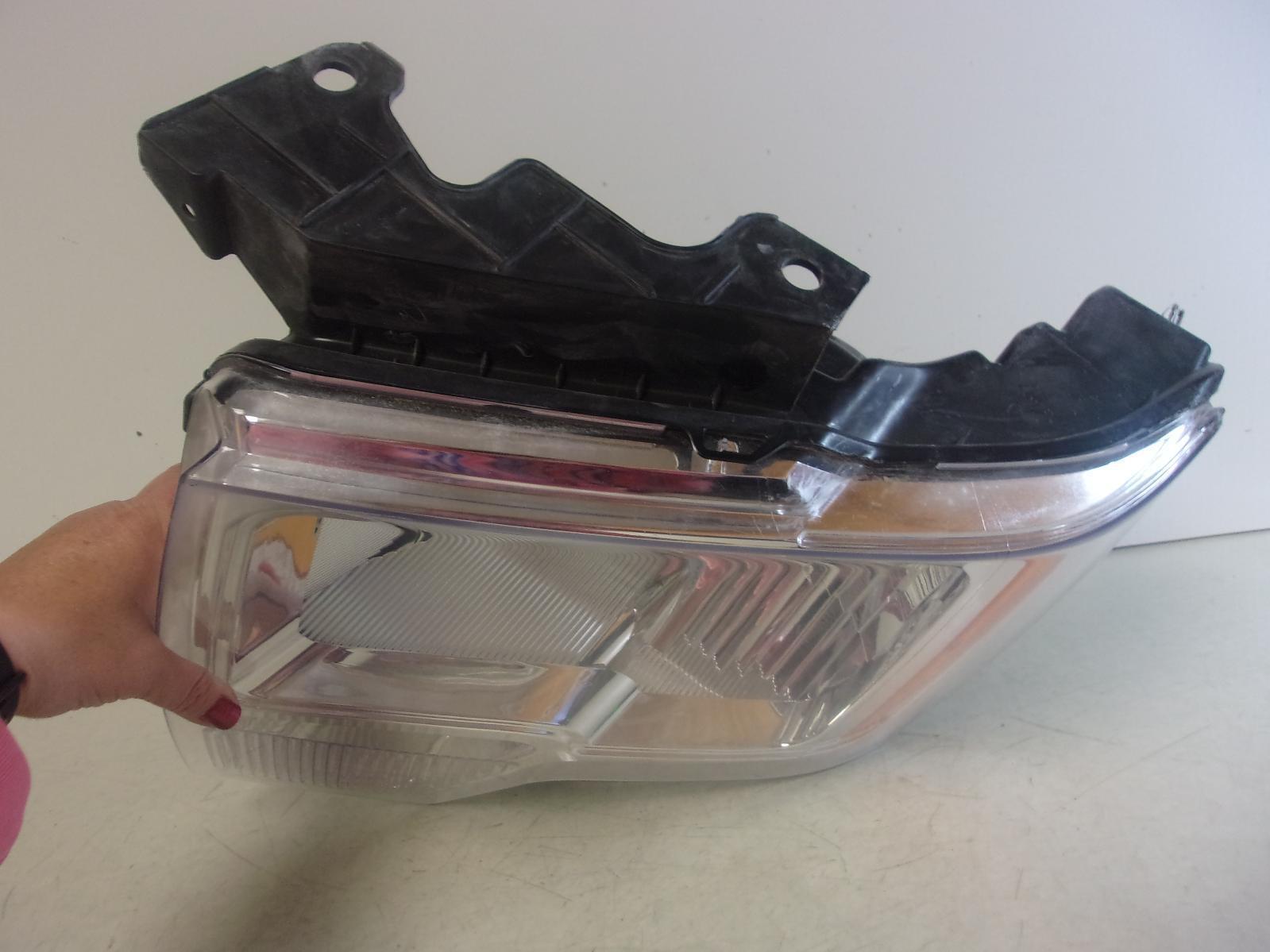 Fits 2009 - 2014 Ford F150 Driver LH Halogen Headlight w/ Bright Trim - Capa